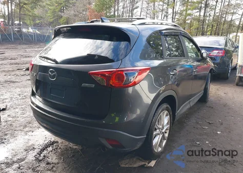 2015 Mazda Cx-5 Grand Touring z USA, uszkodzony, nr VIN JM3KE2DY6F0509015